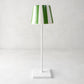 Green and white striped ceramic lamp shade on a white Poldina Pro lamp.