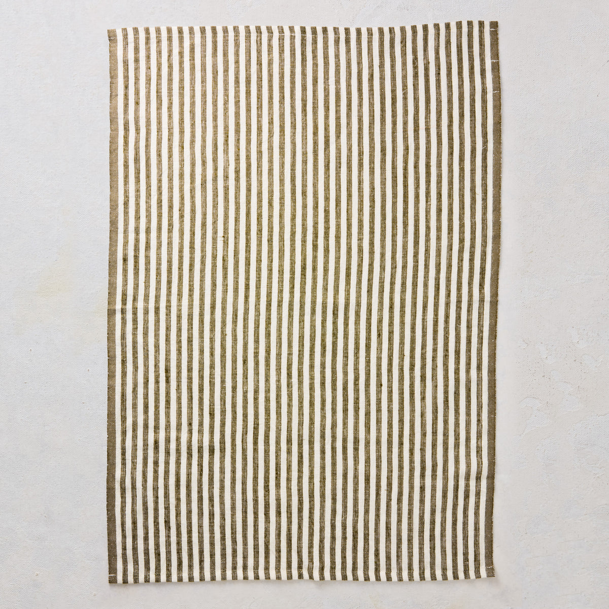 Set of two 30x20 inch green and white ticking stripe linen hand towels with yellow border detail.