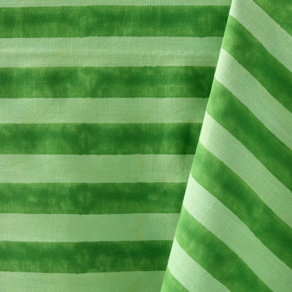 Green Tonal Hampton Stripe Cotton Tablecloth, 70"W x 108"L, with bold horizontal and diagonal stripes.
