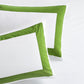 Set of 2 white percale pillow shams with a 4-inch wide green appliqued band.