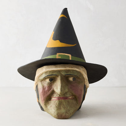 Distressed green papier-mâché witch candy bucket with a black pointed hat, 13 inches tall, vintage Halloween style.