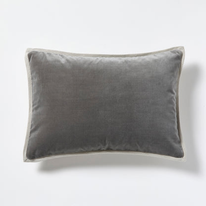 Grey linen and velvet reversible lumbar pillow, 20"L x 14"H.