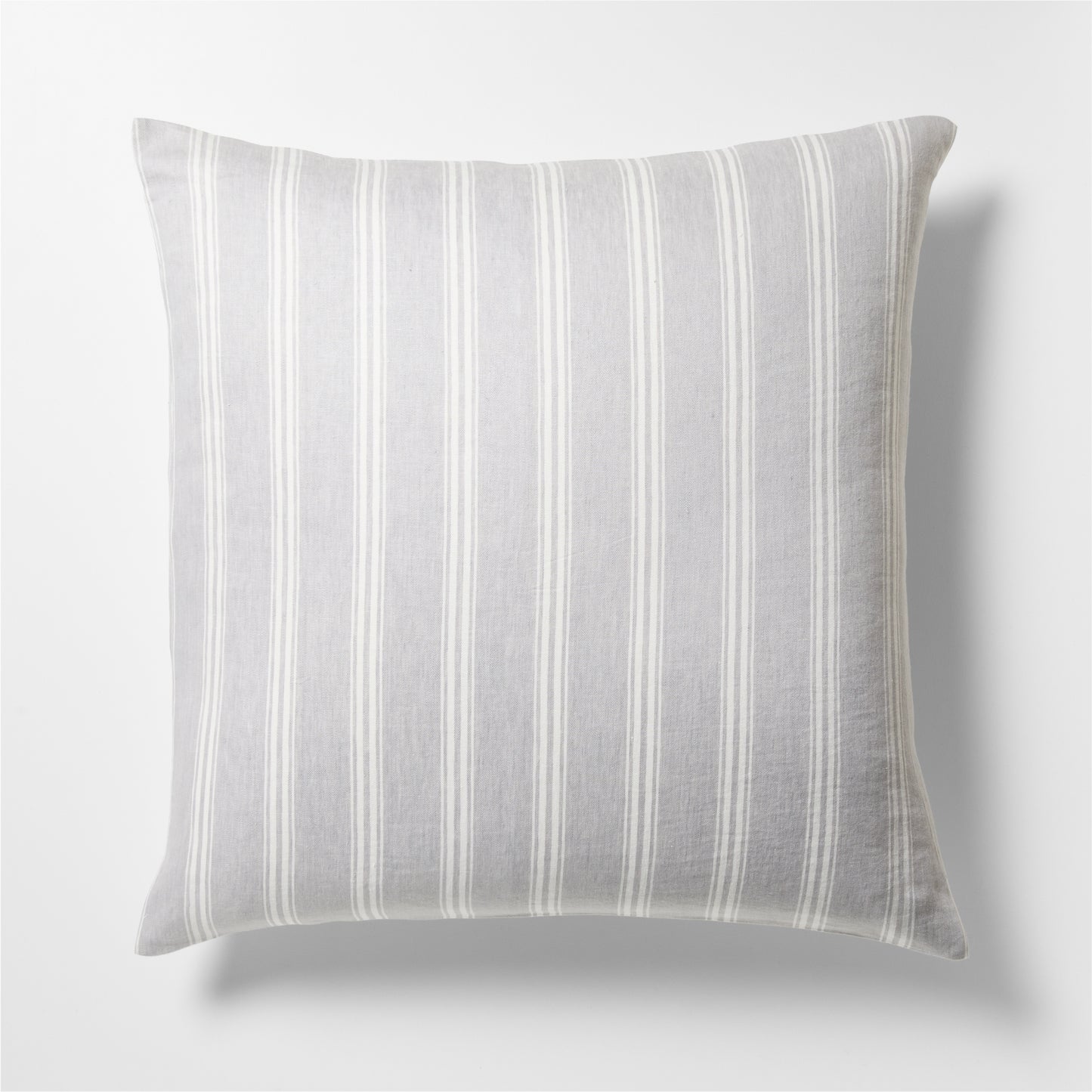 Guest House Stripe Linen Pillow Sham with oyster and light grey vertical stripes.