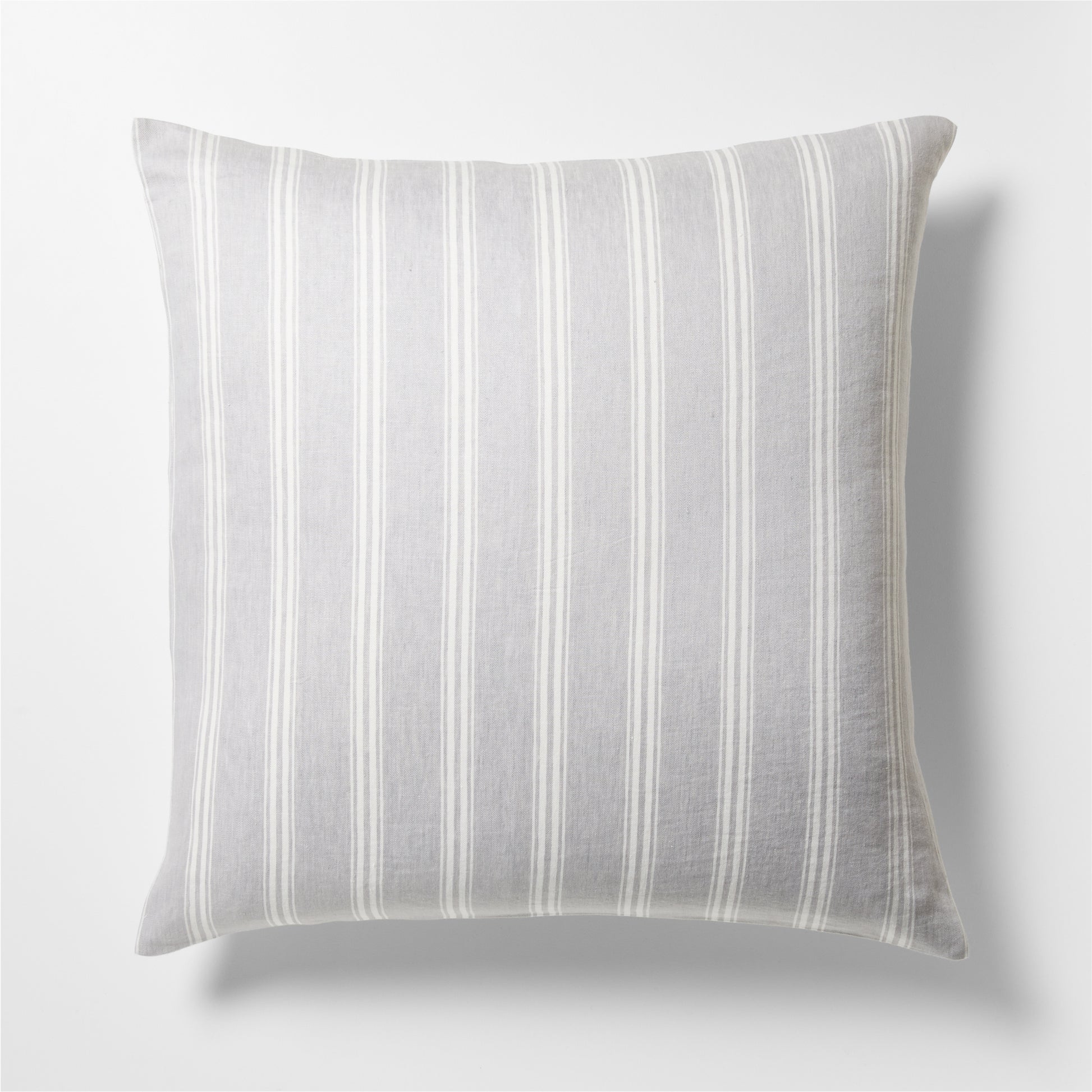 Guest House Stripe Linen Pillow Sham with oyster and light grey vertical stripes.