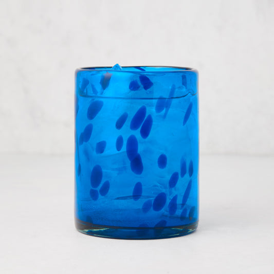 Handmade 12oz blue tortoise double old-fashioned glass, mouth-blown with unique dark blue speckles.