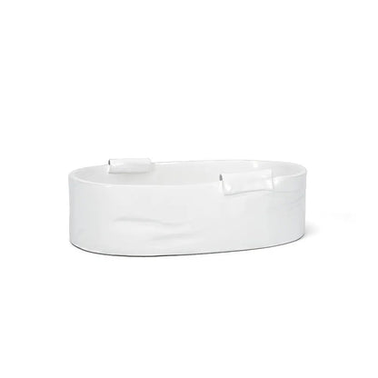 Handmade Montes Doggett Ceramic Baker 4696, small, creamy white glazed, organic shape, 11"L x 7"W x 3"H.