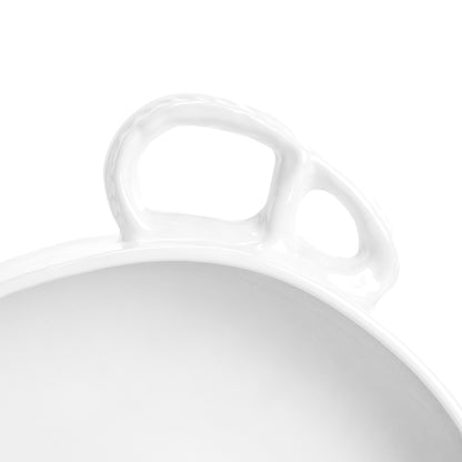 Handmade creamy white ceramic baker with organic shape and unique handle design.