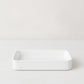 Montes Doggett large rectangular white ceramic baker with 3-inch high edges.