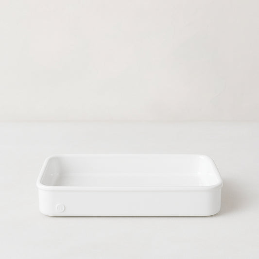 Montes Doggett large rectangular white ceramic baker with 3-inch high edges.