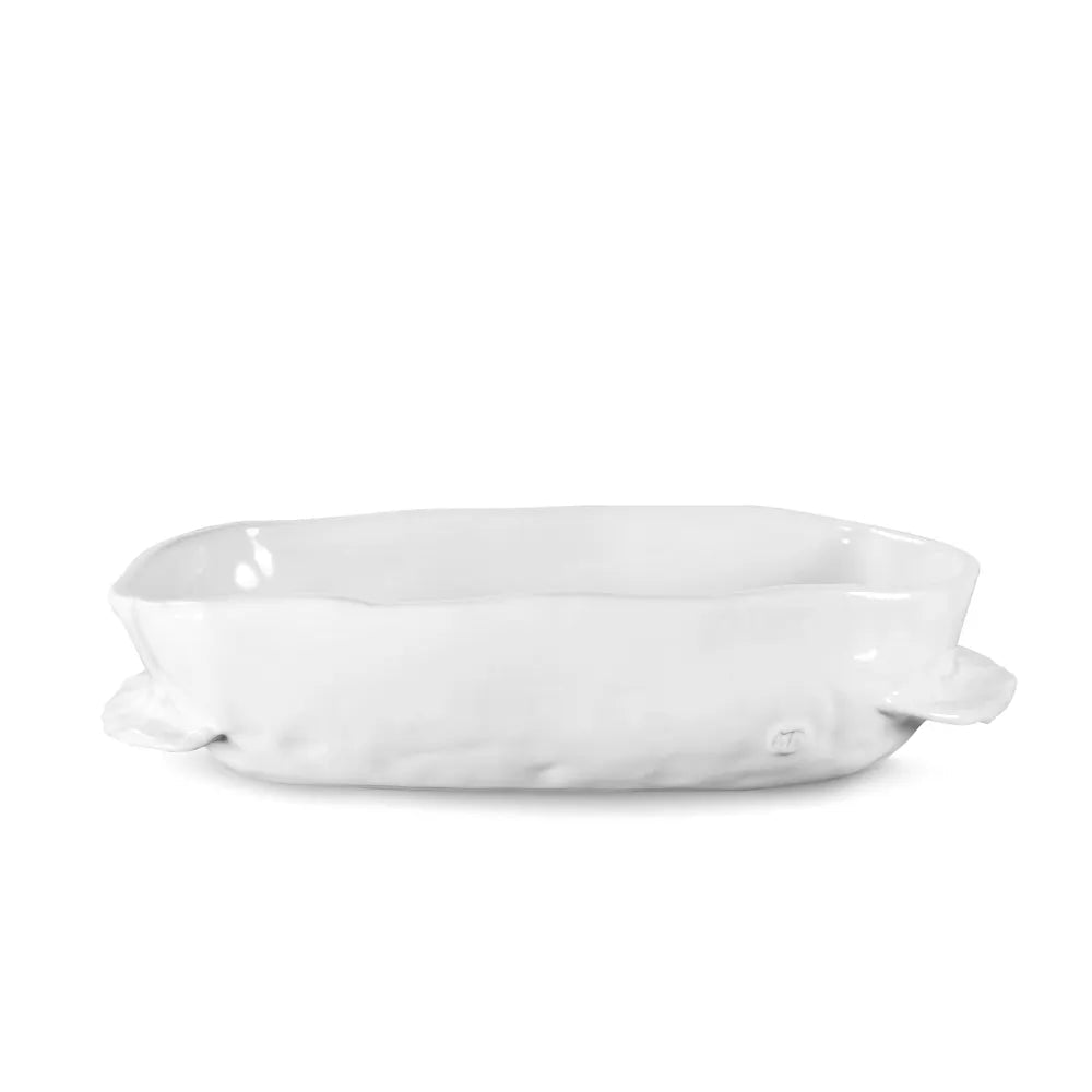 Handmade creamy white ceramic baker 5208 by Montes Doggett, organic shape, 12"L x 8"W x 3"H.