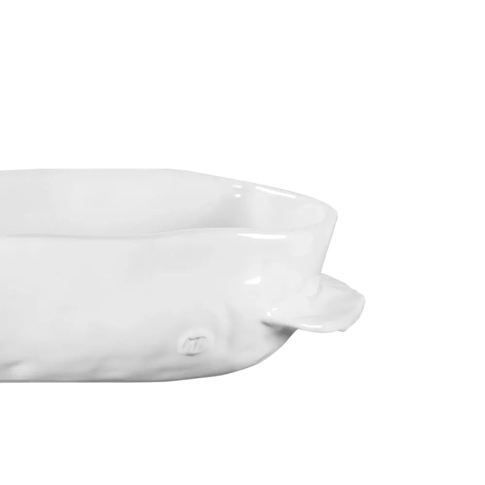 Handmade creamy white ceramic baker 5208 by Montes Doggett, organic shape, 12"L x 8"W x 3"H.