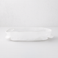 Handmade creamy white ceramic baker 5208 by Montes Doggett, organic shape, 12"L x 8"W x 3"H.