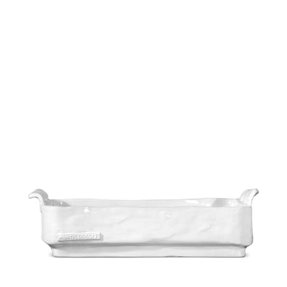 Handmade creamy white ceramic baker by Montes Doggett, organic shape with small handles.