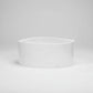 Large handmade ceramic bowl by Montes Doggett, creamy white glaze, oval shape.