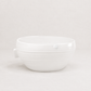 Handmade Montes Doggett ceramic bowl, creamy white glaze, 11.5"D x 5.5"H, subtle horizontal ridges.