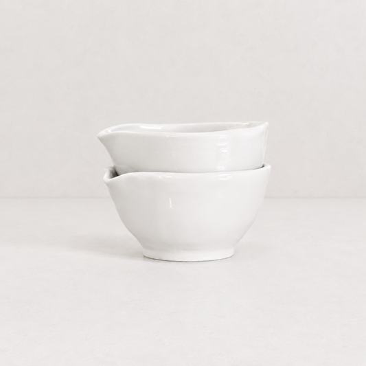 Set of two handmade Montes Doggett creamy white ceramic bowls, 6.5"Dia x 3.5"H, stacked.