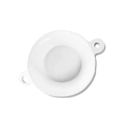 White ceramic bowl with two small handles, Montes Doggett 5285-L.