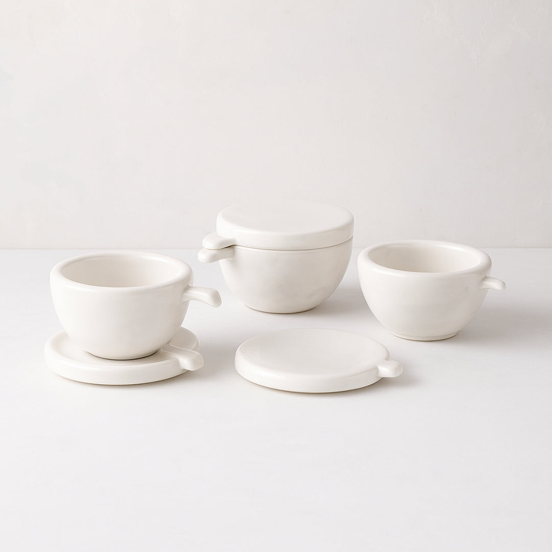 Montes Doggett set of 3 handmade white ceramic bowls with lids/coasters and handles.