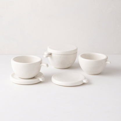 Montes Doggett set of 3 handmade white ceramic bowls with lids/coasters and handles.