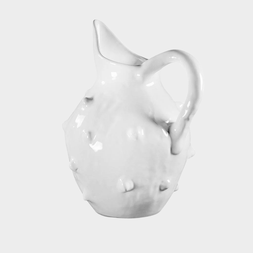 Handmade creamy white ceramic bumpy pitcher by Montes Doggett, 6.5"Dia x 11"H.