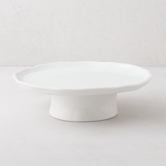 Small Montes Doggett handmade ceramic cake stand, creamy white glaze, organic design, 11"Dia x 4"H.