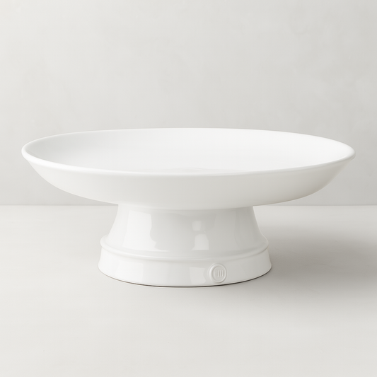 Handmade creamy white ceramic catchall pedestal bowl, 12.5"D, by Montes Doggett.