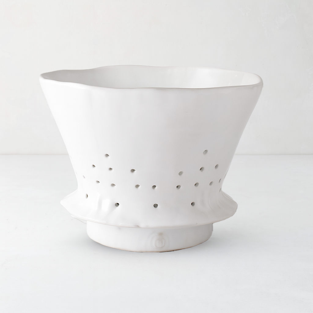 Handmade creamy white ceramic colander by Montes Doggett, 9.5"Dia x 7.5"H, with drainage holes.