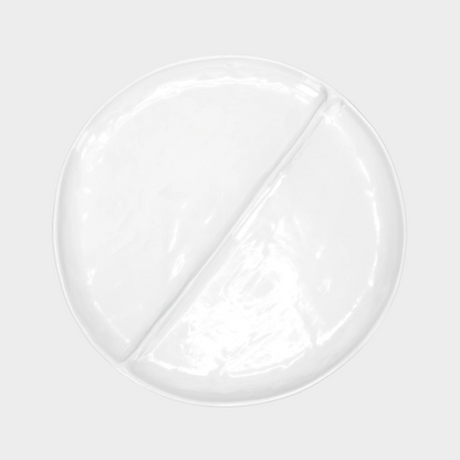 Handmade Montes Doggett creamy white ceramic 15" divided plate with two sections.