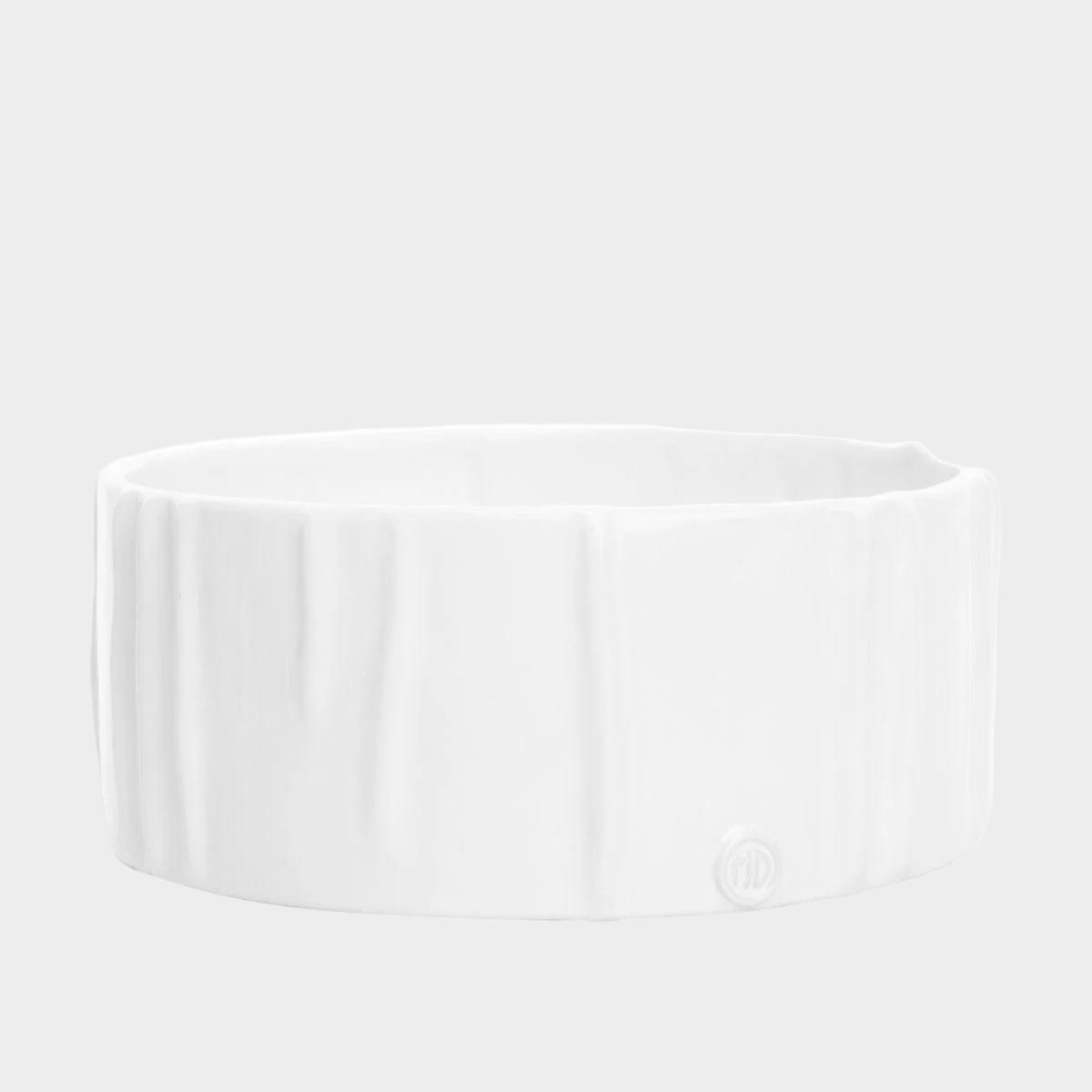 Handmade creamy white ceramic dog bowl by Montes Doggett, 8"Dia x 3"H, with textured sides.