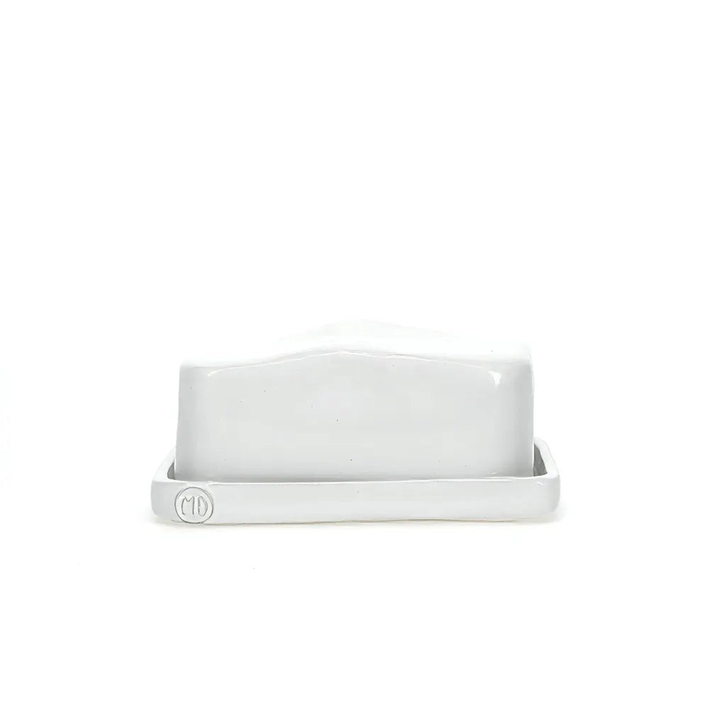 Handmade Montes Doggett ceramic European butter dish with creamy white glaze and "MD" logo.