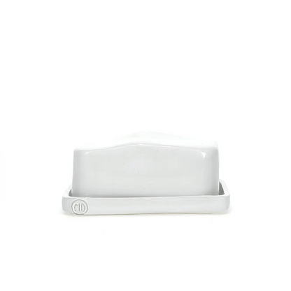 Handmade Montes Doggett ceramic European butter dish with creamy white glaze and "MD" logo.
