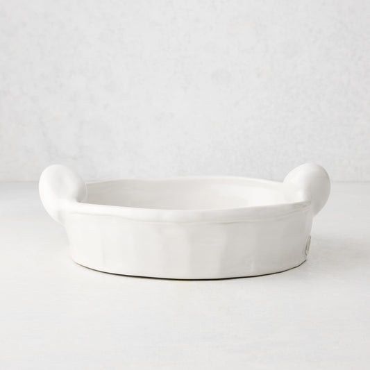 Handmade Montes Doggett ceramic round baker, creamy white glaze, 9"Dia x 2.5"H, with small handles.