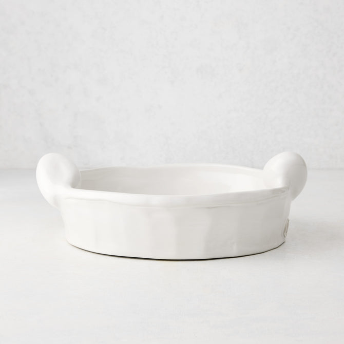 Handmade Montes Doggett ceramic round baker, creamy white glaze, 9"Dia x 2.5"H, with small handles.