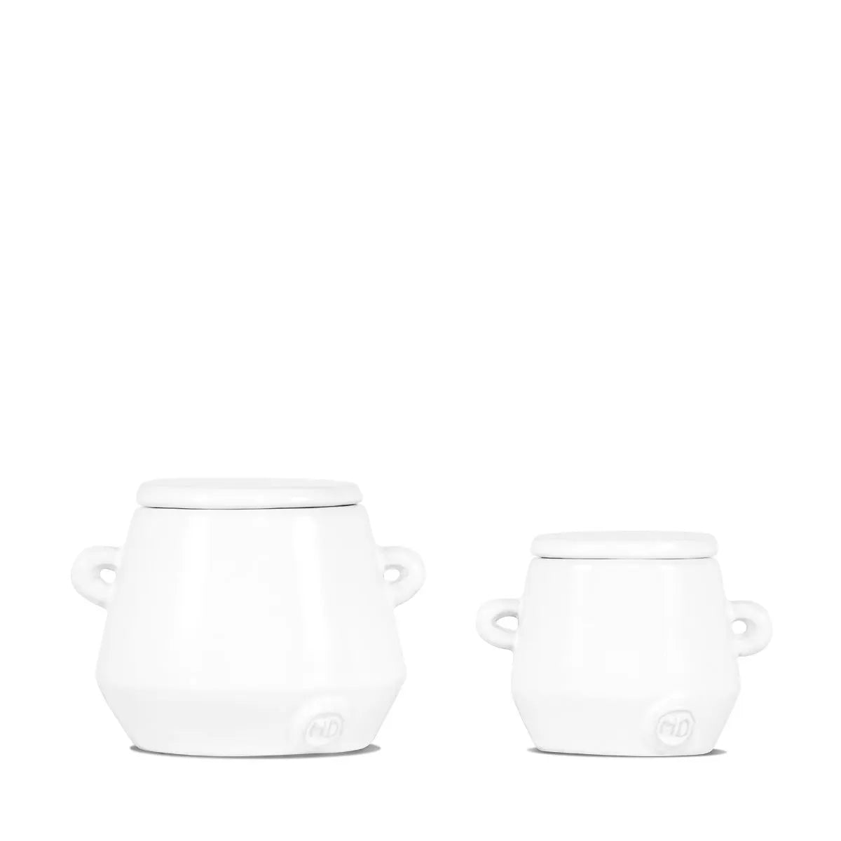 Set of 2 handmade creamy white ceramic mini canisters with lids and small handles, by Montes Doggett.