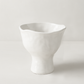 White ceramic pedestal bowl by Montes Doggett, handmade with organic shapes and textured glaze.