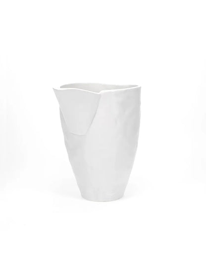 Handmade creamy white ceramic pitcher by Montes Doggett, 9.5"L x 6.5"W x 10"H.