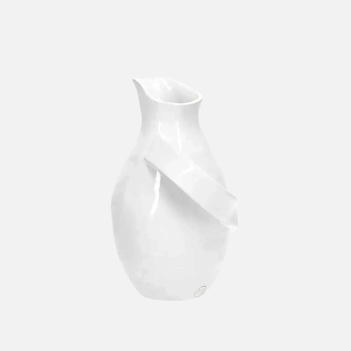 montes doggett 4652handmade white ceramic pitcher with a unique sculptural handle, crafted in Peru.