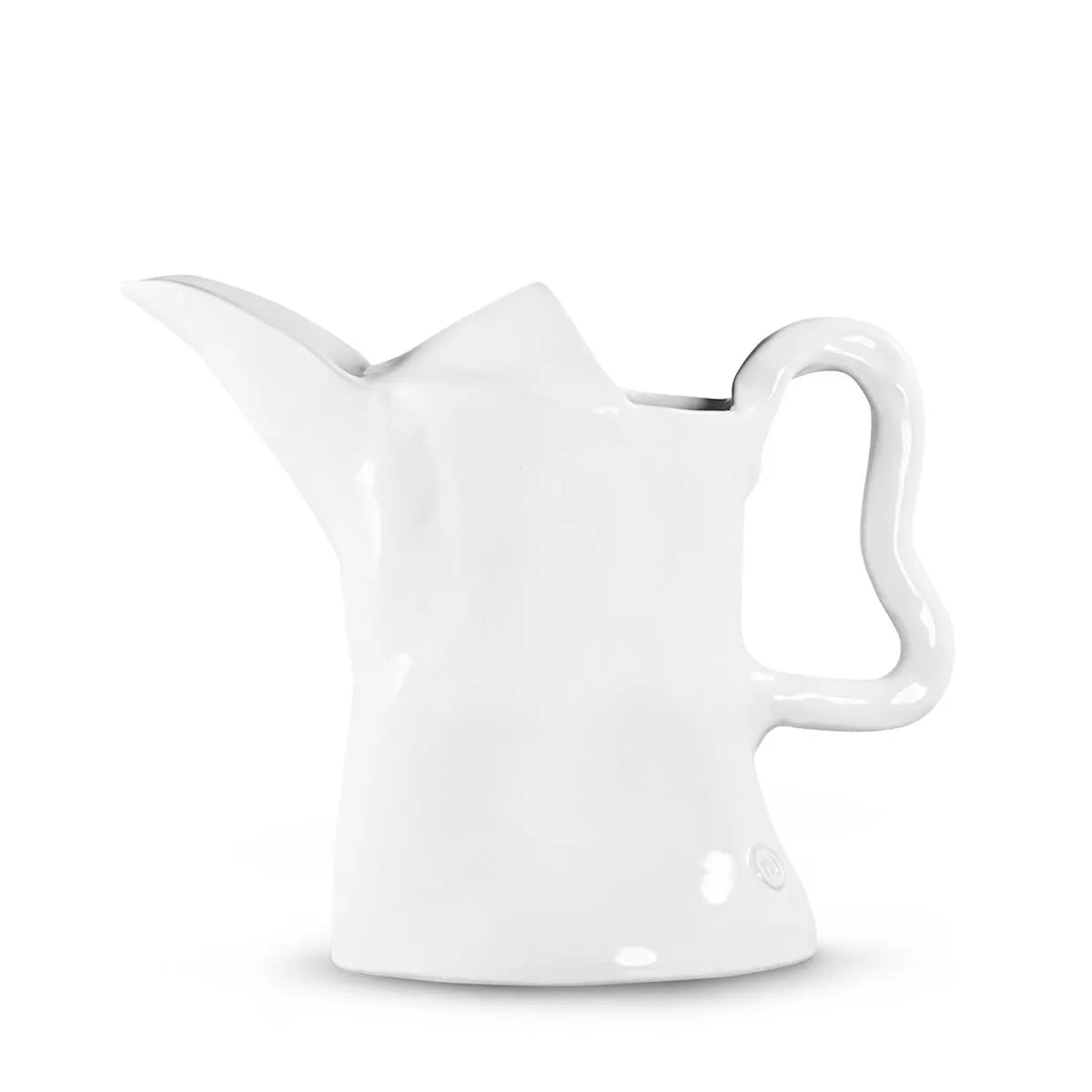 Handmade creamy white ceramic pitcher with organic shape, by Montes Doggett.