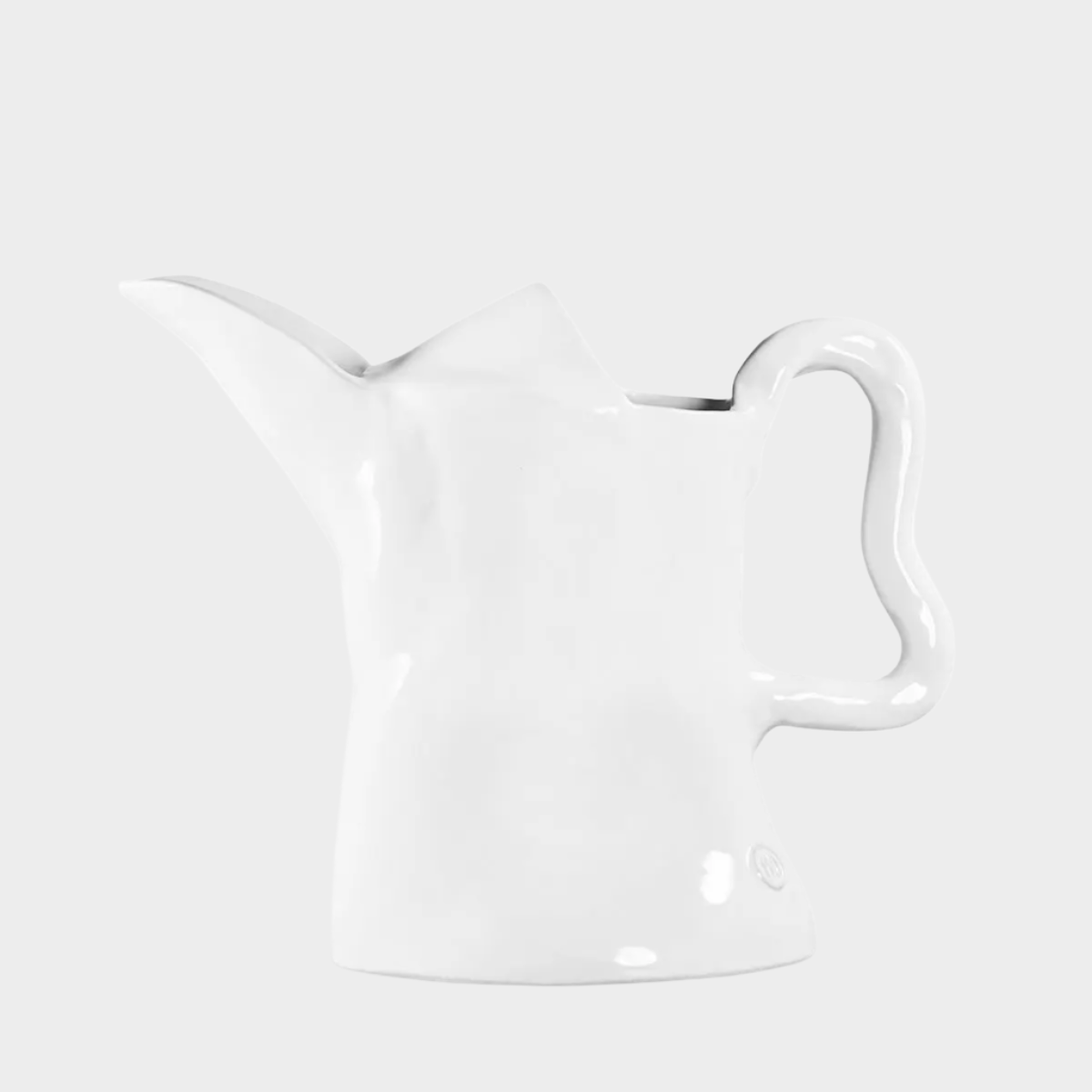 Handmade creamy white ceramic pitcher by Montes Doggett, organic shape, 9"H.
