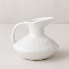 Handmade creamy white ceramic pitcher 5431 by Montes Doggett, organic shape, 11"D x 10"H.