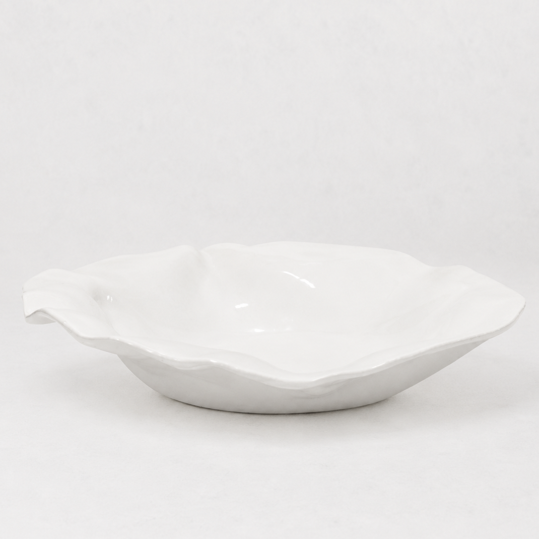 Handmade Montes Doggett ceramic platter, creamy white glaze, organic wavy rim, 16"l x 14.5"w.