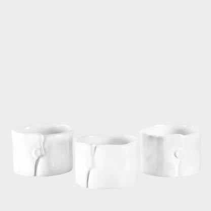 Set of 3 handmade Montes Doggett creamy white ceramic ramequins, 3"Dia x 2"H, with organic shape.
