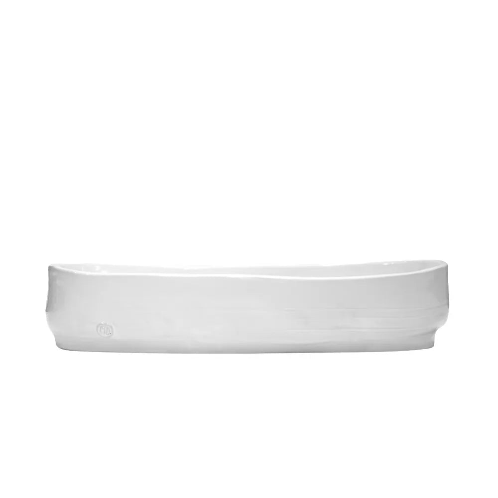 Handmade creamy white glazed ceramic serve bowl by Montes Doggett, 15.5"L oval shape.