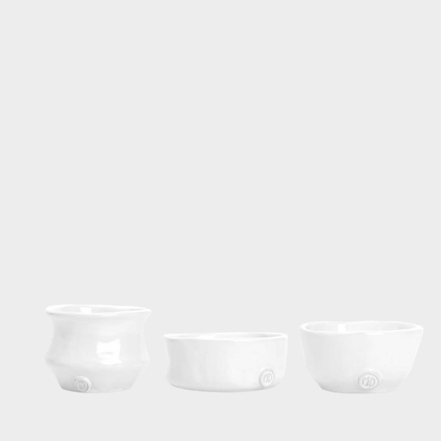 Set of 3 Montes Doggett handmade creamy white ceramic serve bowls, organic shapes.