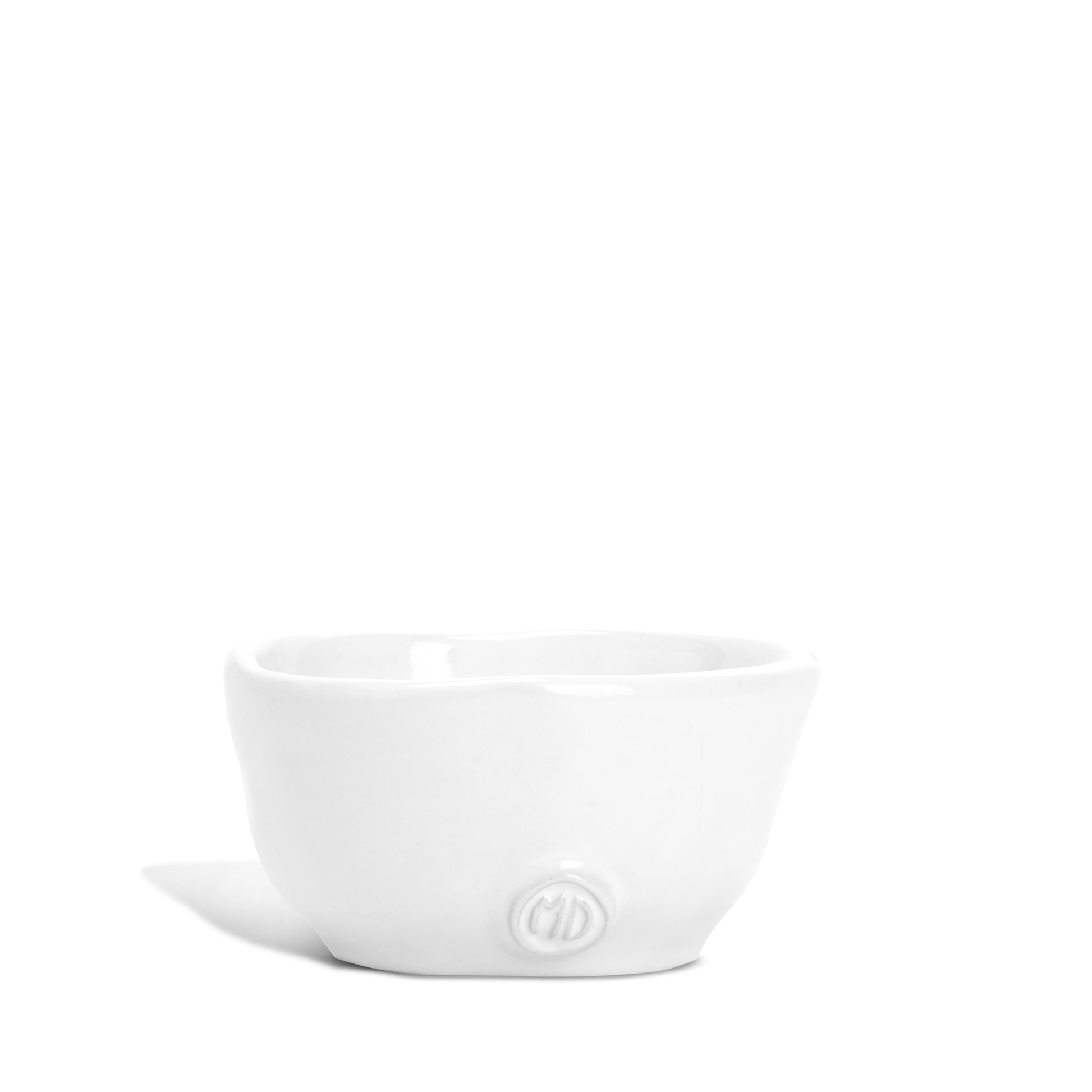 Handmade Montes Doggett creamy white ceramic serve bowl 4884 with organic shape and MD logo.
