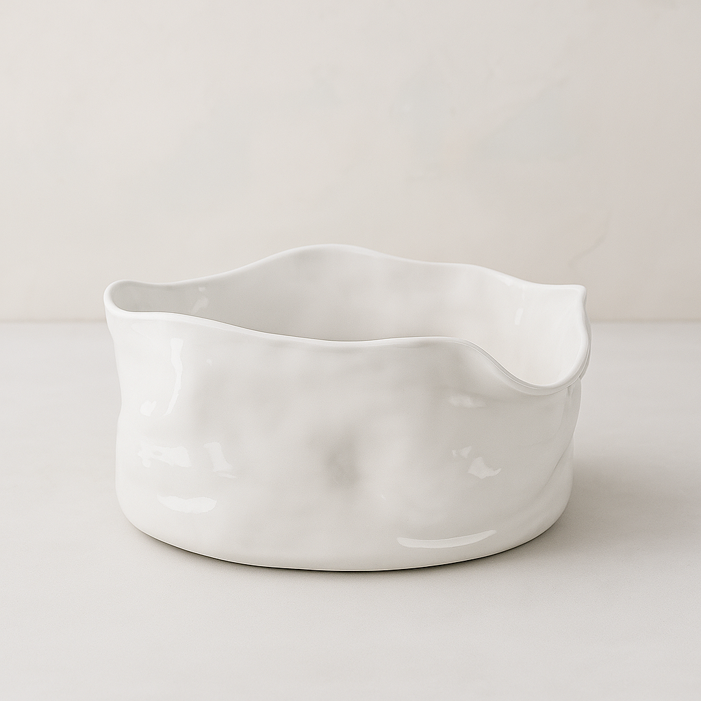 Handmade white ceramic serve bowl by Montes Doggett, organic shape, 12"L x 11"W x 7"H.