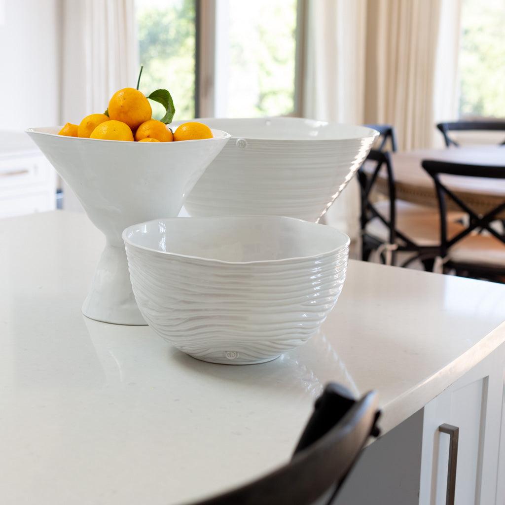 Handmade creamy white ceramic serve bowl by Montes Doggett with desert-inspired ripples, 12.5"Dia x 6.75"H.