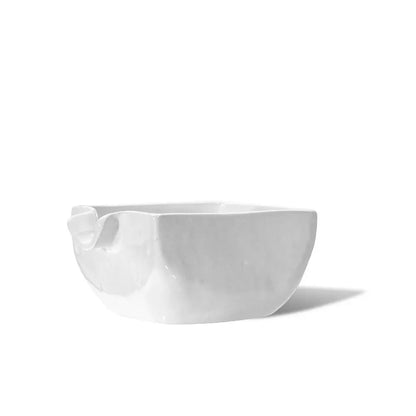 Handmade creamy white ceramic serve bowl 5428 by Montes Doggett, organic shape with curved rim.