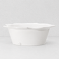 Handmade Montes Doggett ceramic small bowl, creamy white glaze, scalloped rim, 12"Dia x 4.5"H.