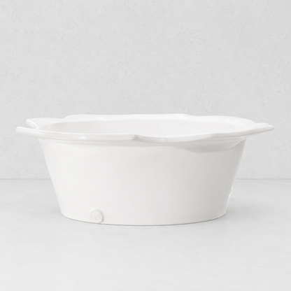 Handmade Montes Doggett ceramic small bowl, creamy white glaze, scalloped rim, 12"Dia x 4.5"H.